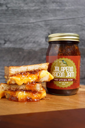 Green Jay Gourmet Jalapeno Bacon Jam on charcuterie board enhances meat and cheese pairing.