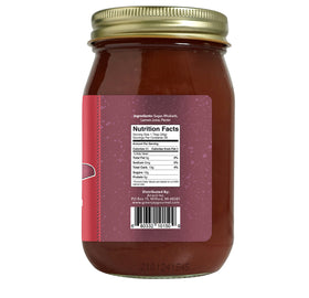 Green Jay Gourmet Rhubarb Jam label closeup highlights natural ingredients and a clean design.
