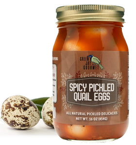 Green Jay Gourmet spicy pickled quail eggs in a jar ready to enjoy.
