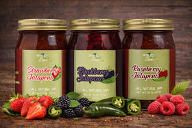 Green Jay Gourmet Strawberry Jalapeno Jam jar closeup emphasizes fresh strawberries and jalapeño balance.