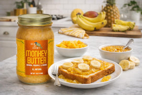 Green Jay Gourmet Monkey Butter pineapple-mango blend, perfect topping for croissants.