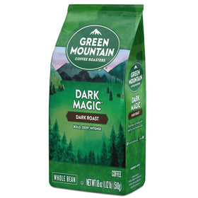 Green Mountain Dark Magic bag open beside freshly ground coffee.