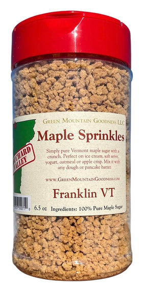 Green Mountain Goodness maple sprinkles bottle showcasing pure maple crunch, great for toppings.