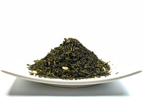Greenhilltea Decaf Jasmine Green Tea flower close-up showing fragrant jasmine blossoms.