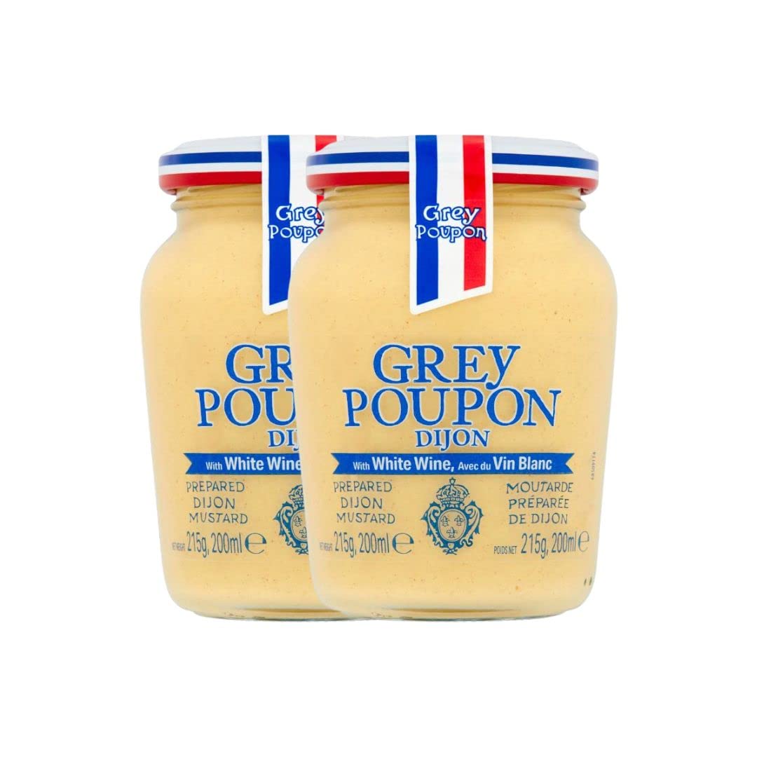 Grey Poupon Dijon mustard jar closeup showcasing smooth, refined texture for premium sandwiches.