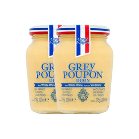 Grey Poupon Dijon mustard jar closeup showcasing smooth, refined texture for premium sandwiches.