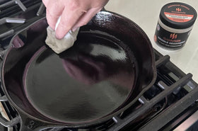 GriddleMATe cast-iron seasoning forming a durable shield against rust and wear