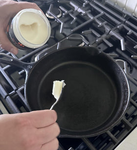 GriddleMATe seasoning layer on skillet creating a protective non-stick-ready surface