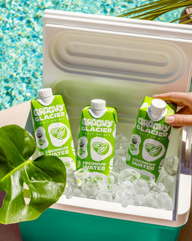 Groovy Glacier coconut water in a glass shows tropical refreshment.