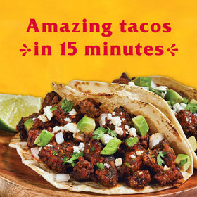 Ground beef tacos seasoned with Cholula for bold flavor.