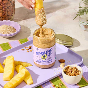 Ground Up nut butter scoop demonstrates convenient serving for snacks.