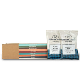 Eight-pack of Grounds & Hounds sample bags ready for brewing, pre-ground for freshness.
