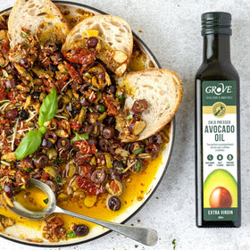 Grove avocado oil in a hot pan for searing.