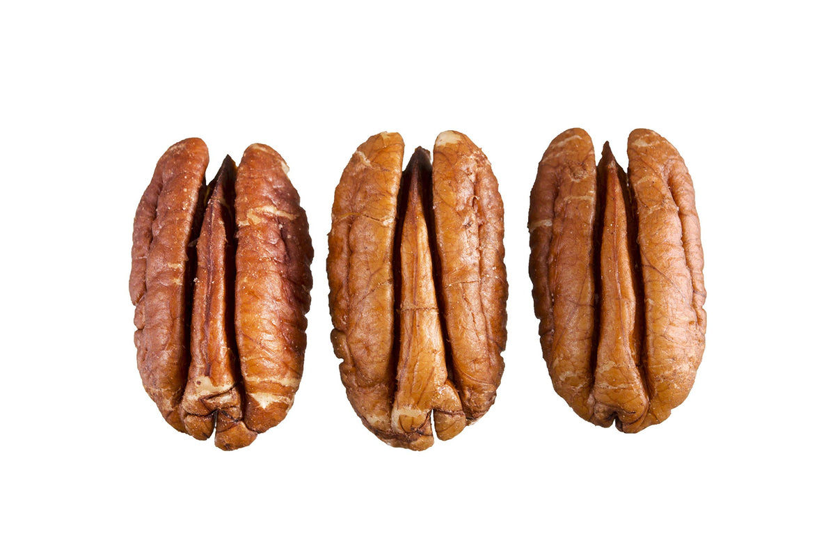 Grupo La Nogalera pecan halves in a bowl for healthy crunch