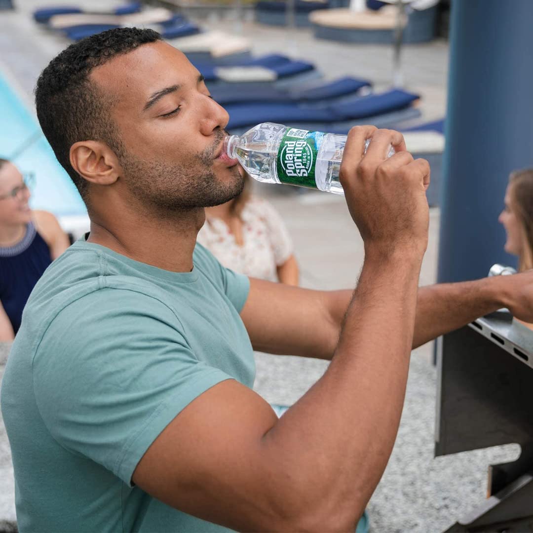 Gym bag ready Gsuila Poland Spring mini water bottles for fast hydration.