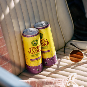 Guayaki Yerba Madre regenerative organic farming badge; emphasizes sustainable sourcing and community impact.