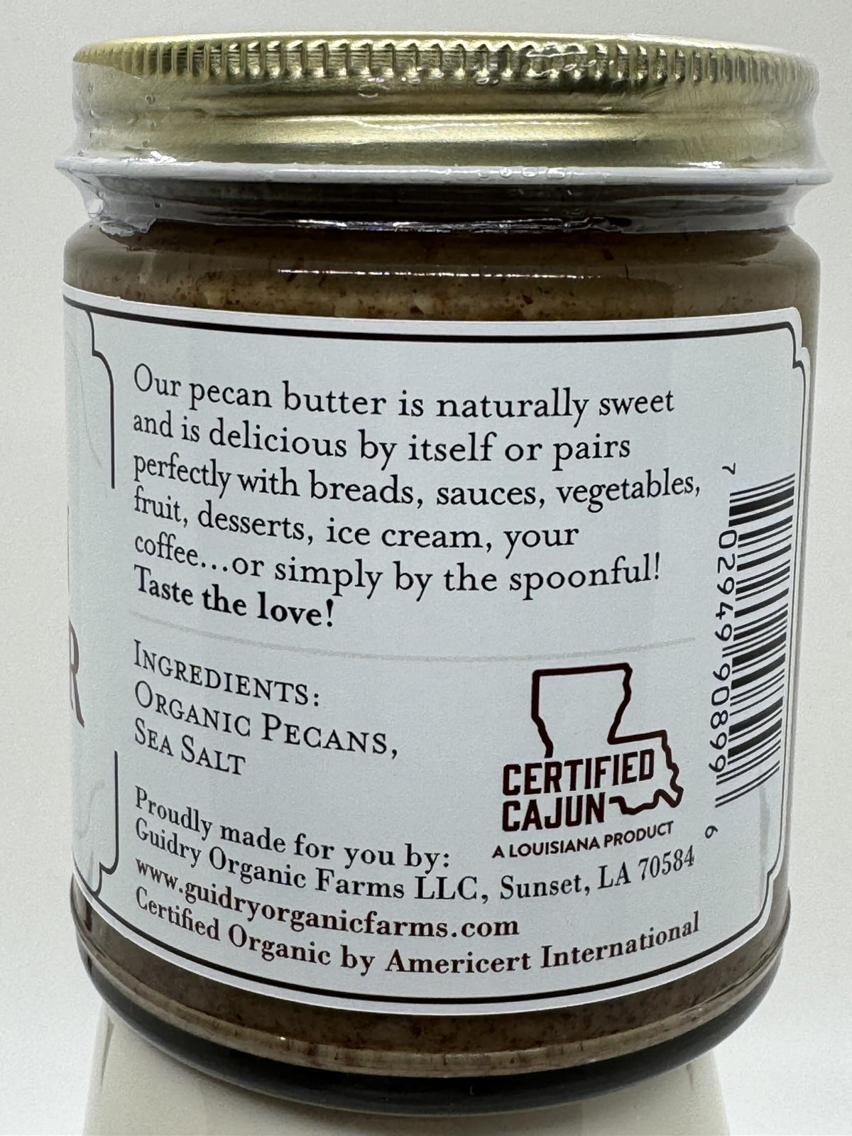Guidry Organic Farms Glass jar packaging emphasizing eco-friendly storage