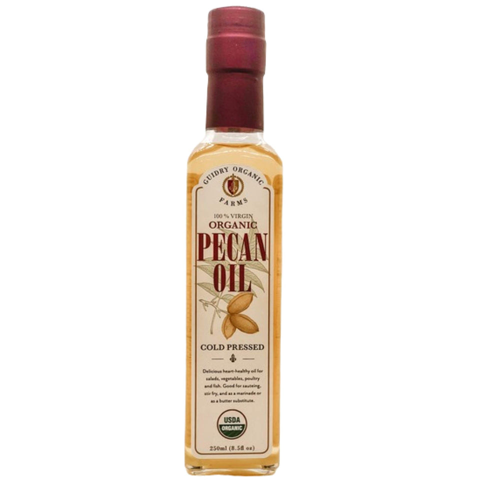 Guidry Organic Farms pecan oil bottle in glass, ideal for high-heat cooking.