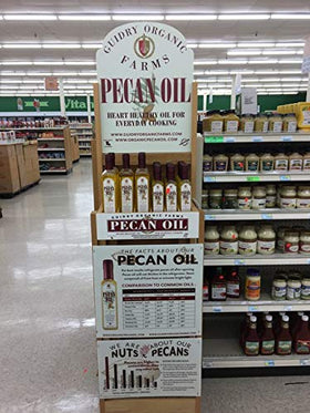 Guidry Organic Farms pecan oil finishing drizzle on roasted vegetables for depth.