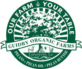 Guidry Organic Farms pecan oil in a cozy kitchen scene highlighting hand-made quality.