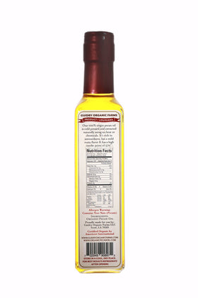 Guidry Organic Farms pecan oil label close-up showing organic certification and aroma.