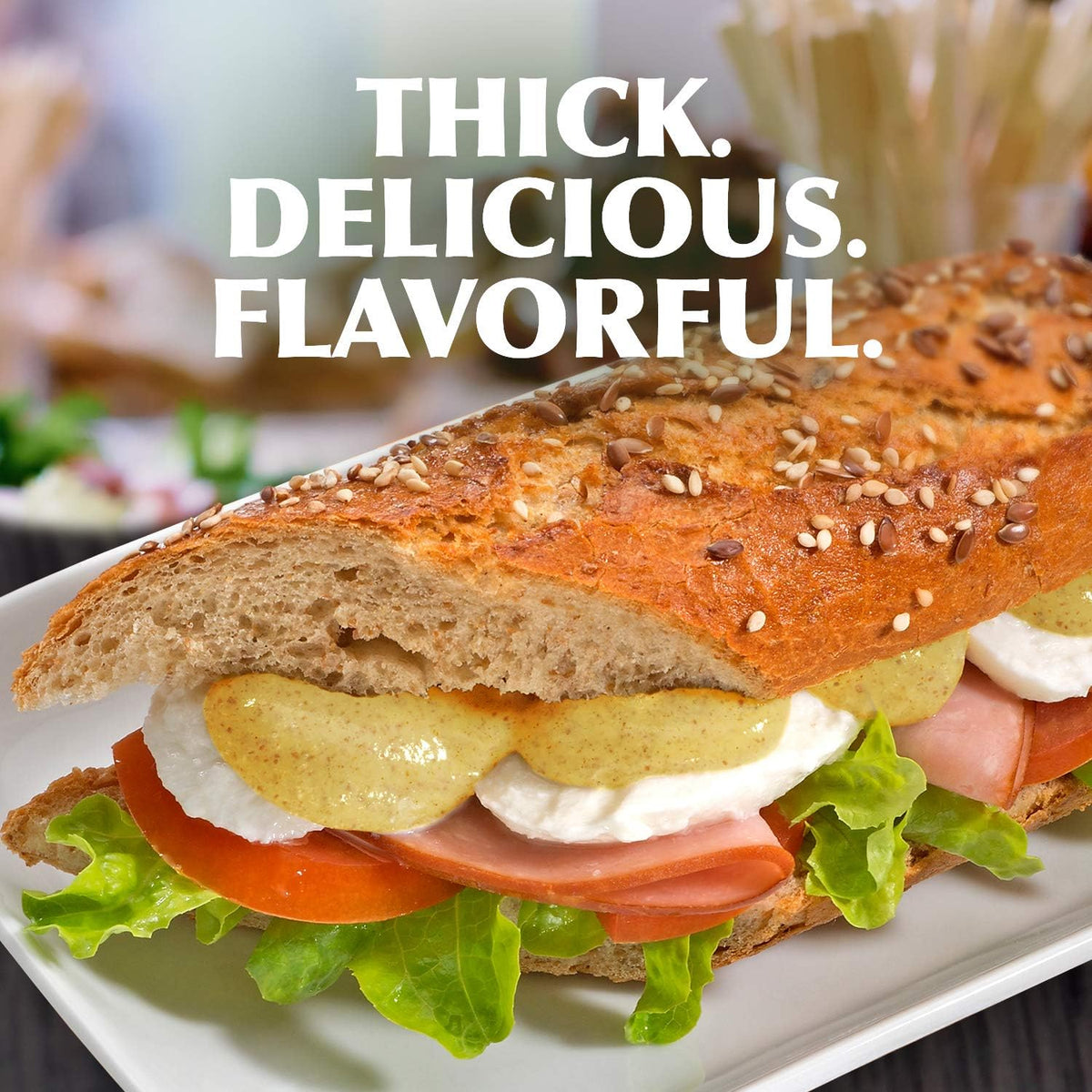 Gulden's Spicy Brown Mustard dipping sample suggests versatile uses beyond sandwiches.