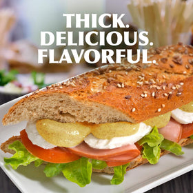Gulden's Spicy Brown Mustard dipping sample suggests versatile uses beyond sandwiches.
