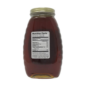 Gunter Apiaries Wildflower Honey jar closeup shows dark, molasses-like finish for drizzle