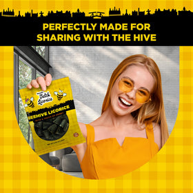 Behold Gustaf's Beehive Drops on a shelf, tasty Dutch candy option.