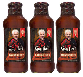 Guy Fieri Kansas City BBQ sauce bottle being poured for smoky, flavorful grilling and dipping.