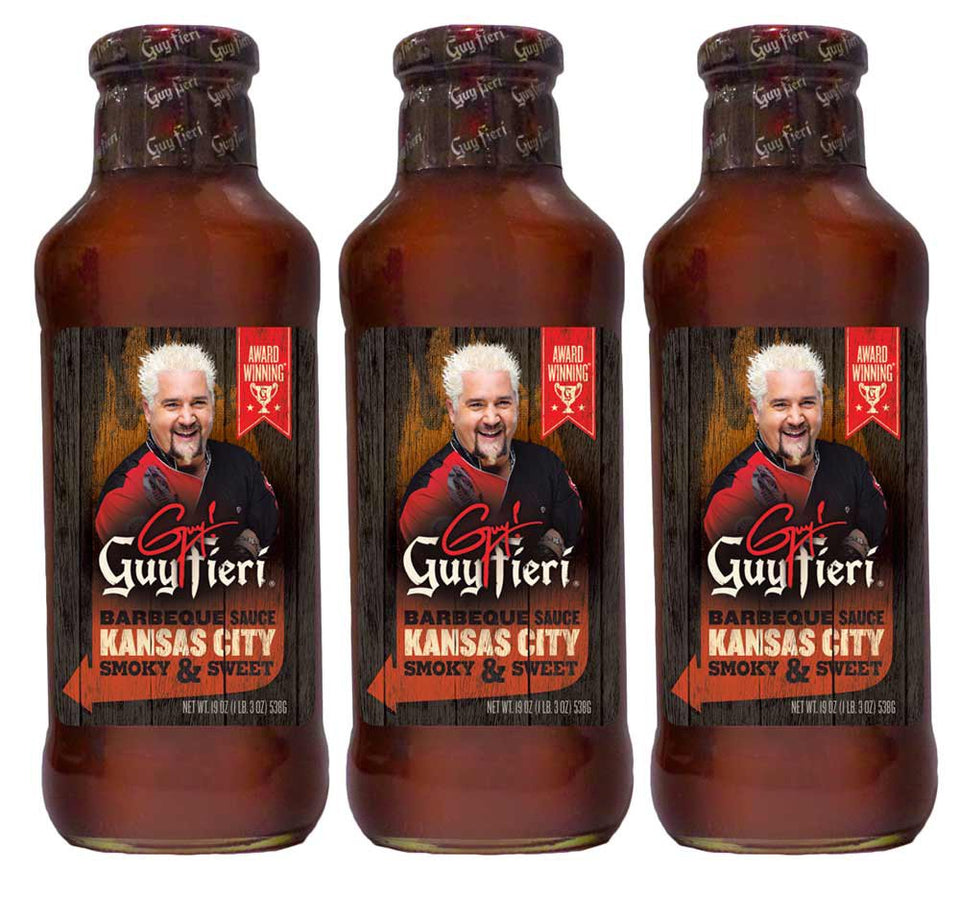 Guy Fieri Kansas City BBQ sauce bottle being poured for smoky, flavorful grilling and dipping.