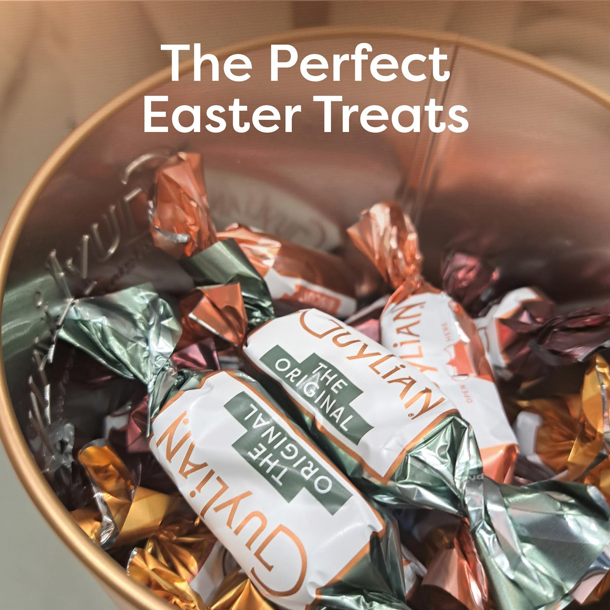 Guylian Belgian chocolate craftsmanship—Fairtrade beans and hazelnuts highlighted.