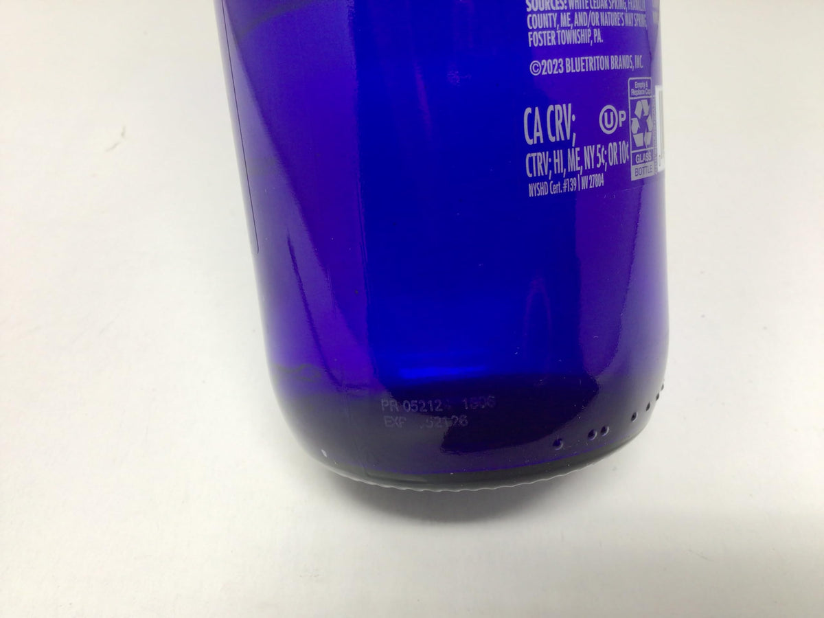 HABP GLOBAL Saratoga Still glass bottle with cap on desk eco-friendly choice