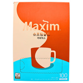 Haitai MAXIM Supreme Gold Coffee stick close-up highlights creamy texture.
