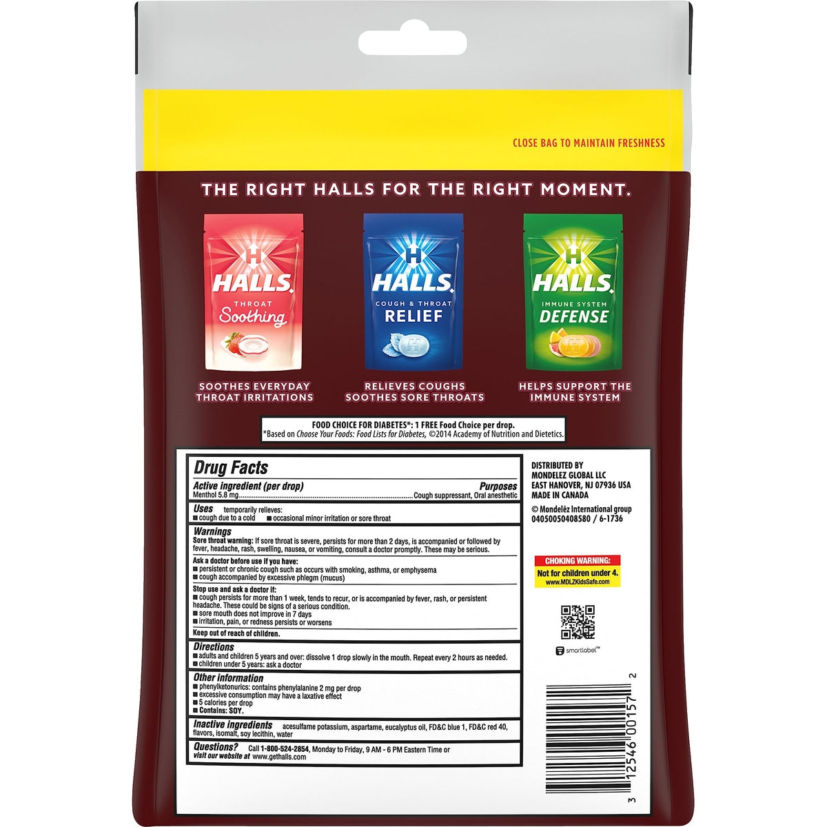 HALLS sugar-free black cherry drops dissolving on tongue for quick soothing
