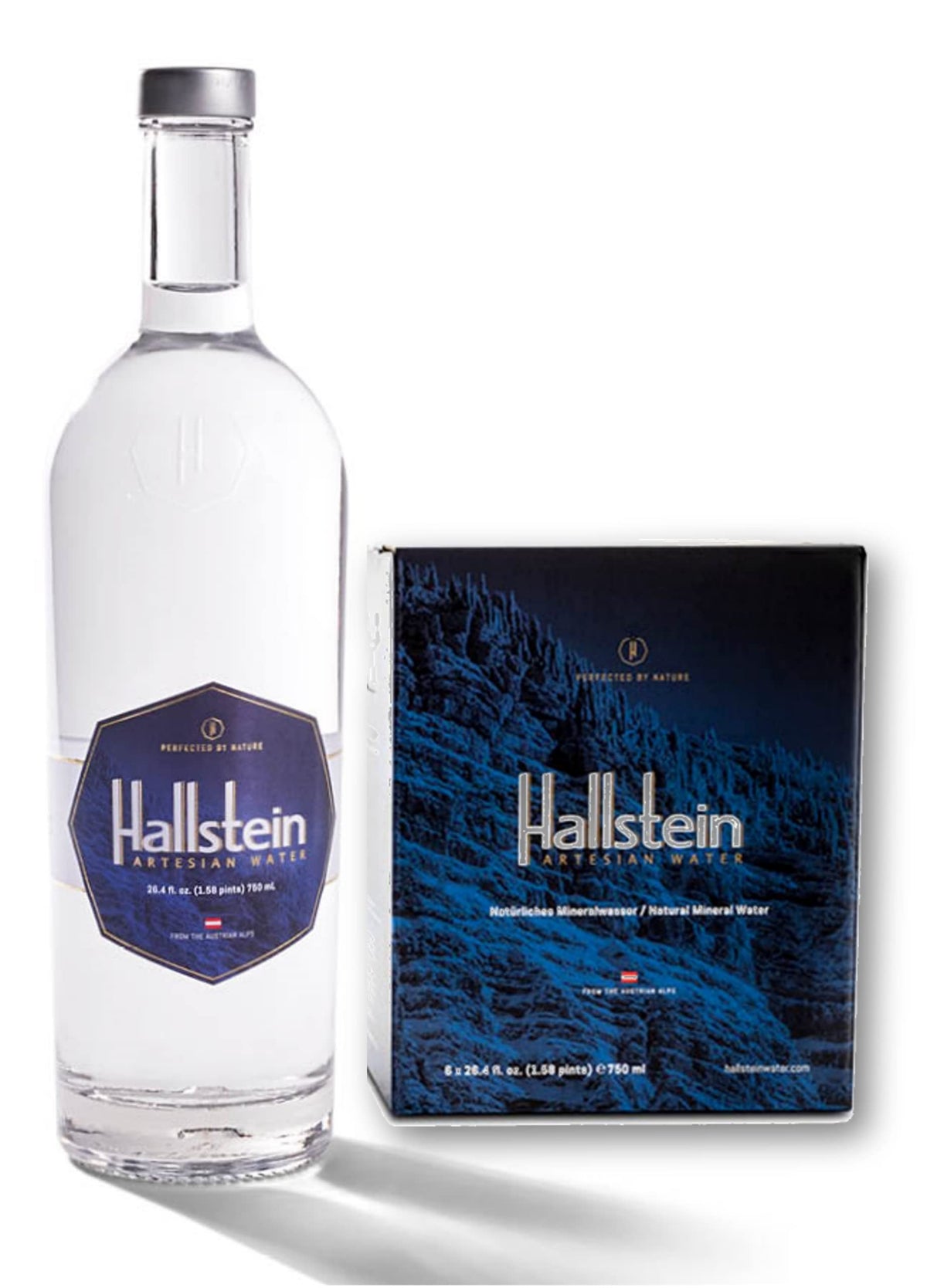 Hallstein Artesian Water glass bottle being poured for crisp, refreshing hydration.