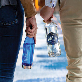 Hallstein Artesian Water mountain source image highlighting pure alpine origins.