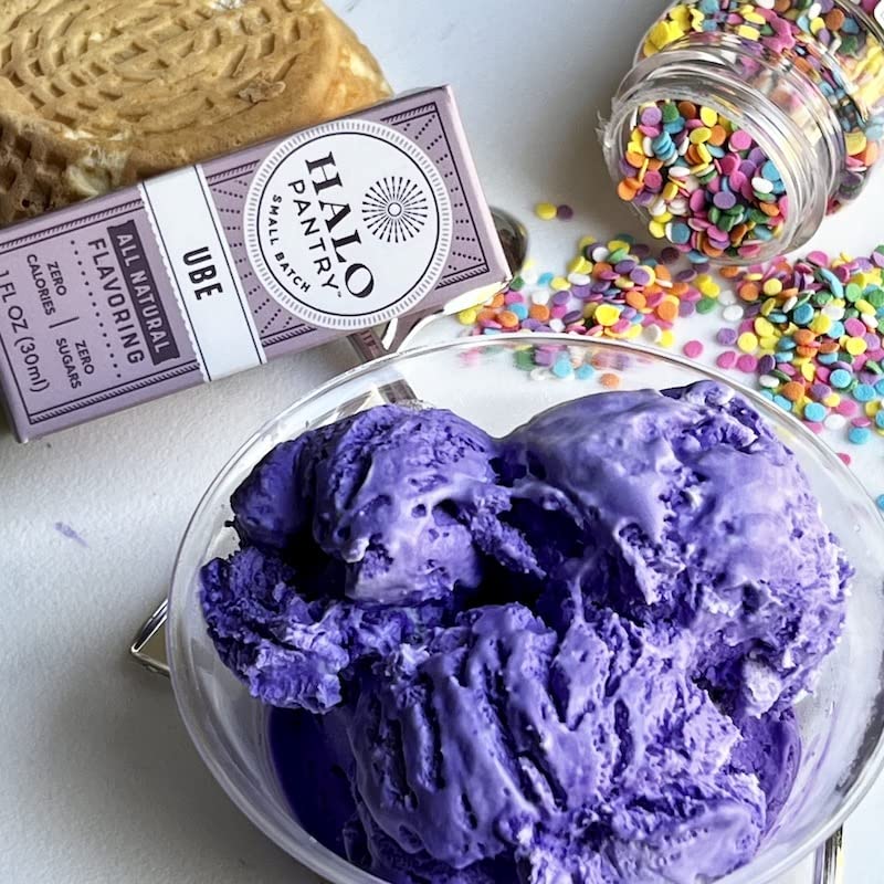 HALO PANTRY UBE flavoring extract beside a cake to inspire frosting use
