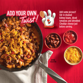 Hamburger Helper Chili Macaroni shredded cheese topping close-up highlighting real cheese.