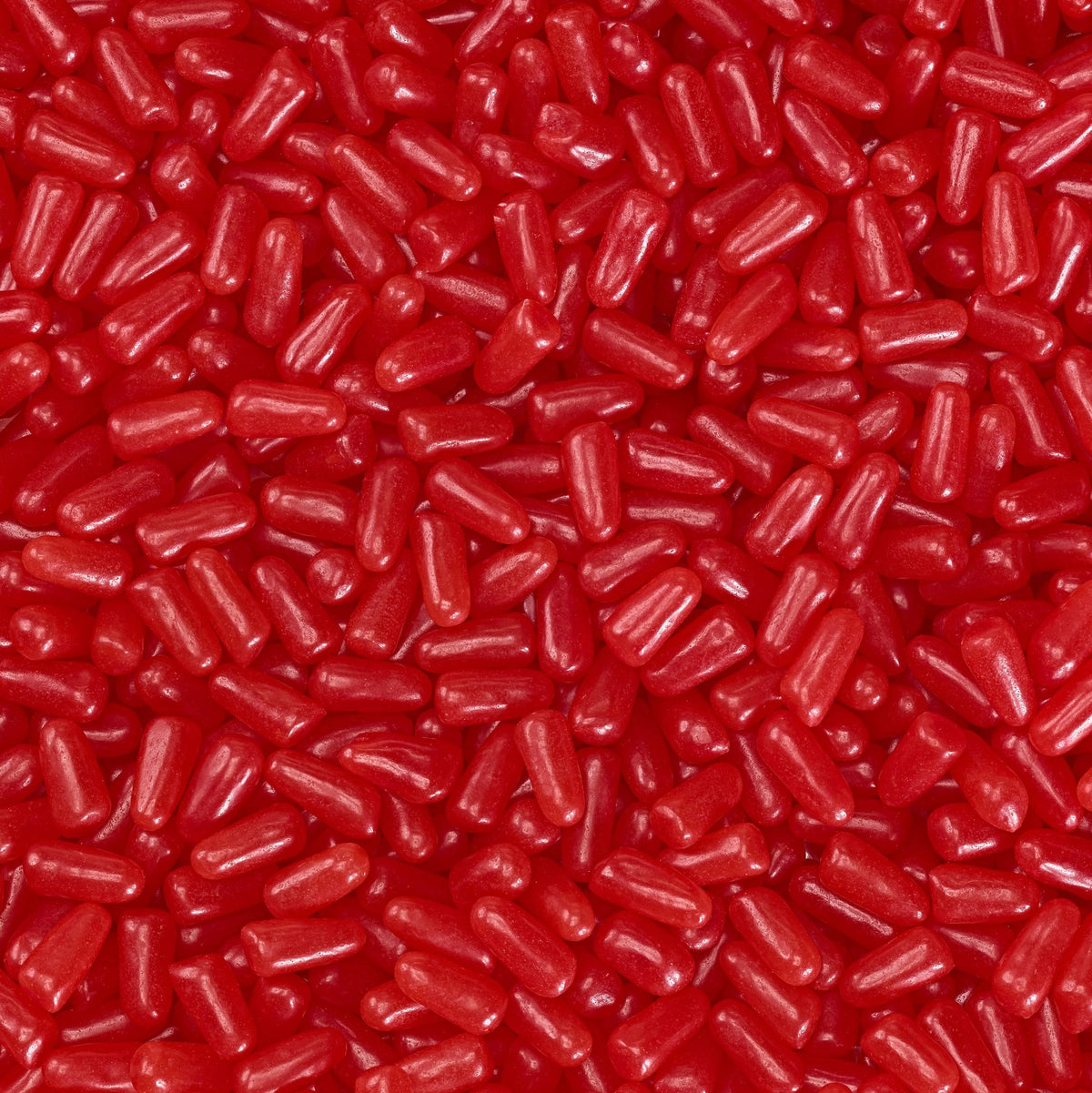 Close-up of bright red Mike and Ike Cherry candies, great for snacking.