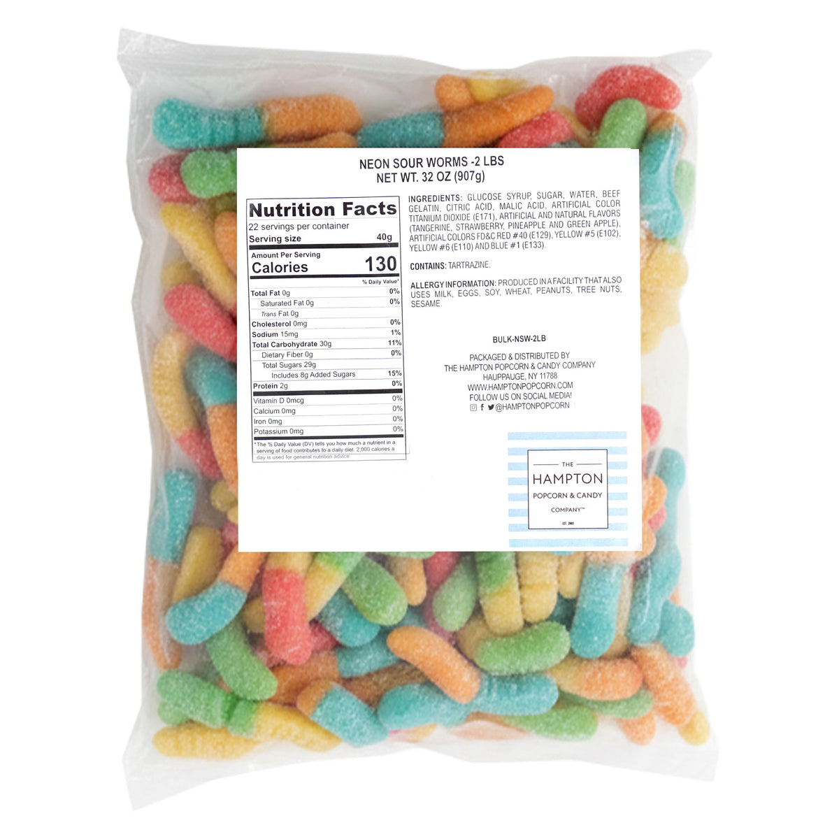 Close-up of The Hampton Candy Company neon sour gummy worms showing chewy texture.