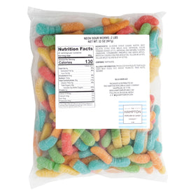 Close-up of The Hampton Candy Company neon sour gummy worms showing chewy texture.