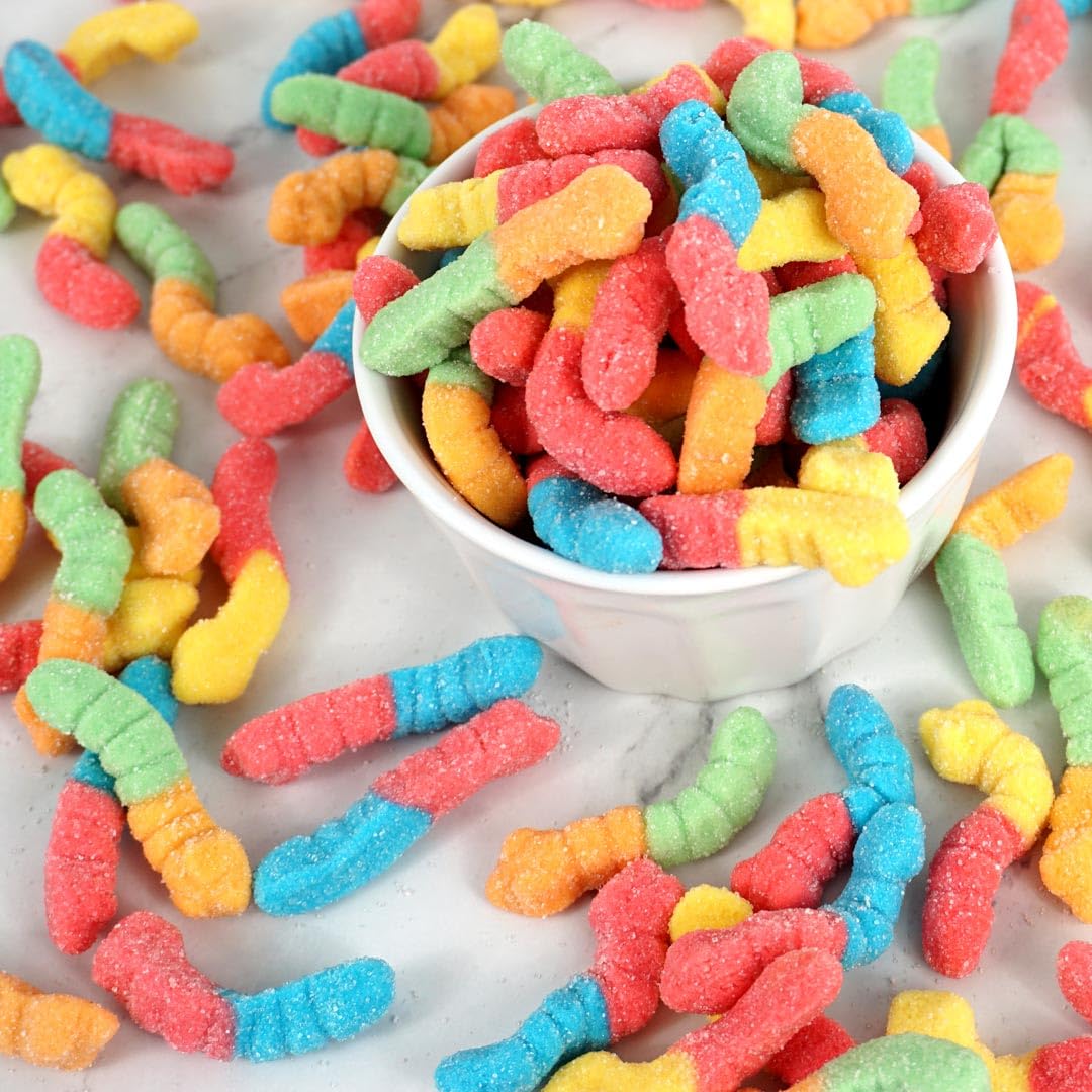 The Hampton Candy Company neon sour gummy worms in a colorful bowl for movie nights.