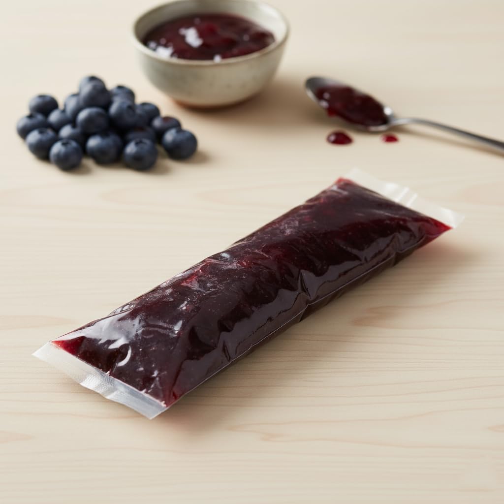 Hampton Distribution blueberry pie filling on finished dessert slice showing rich color.