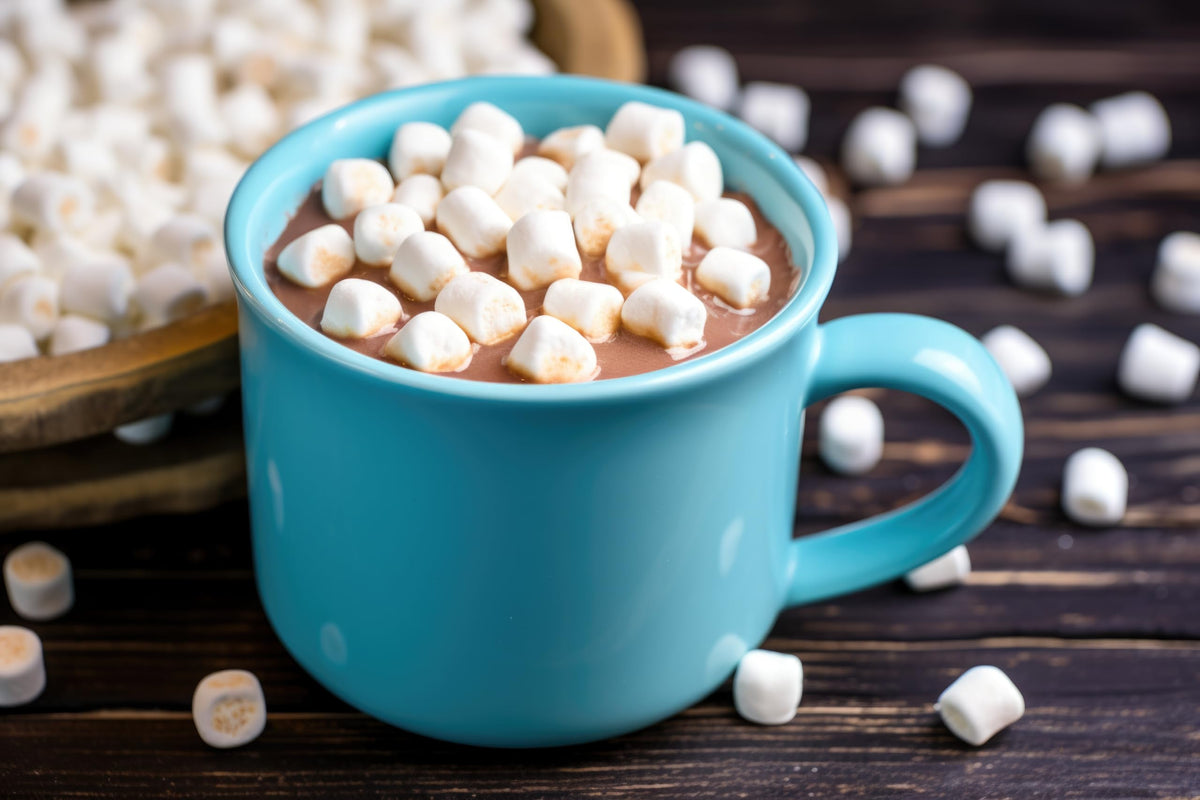 Steaming cup of SwissMiss cocoa with marshmallows, perfect for a chilly evening
