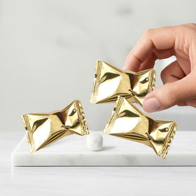 Close-up of The Hampton Gold Buttermints creamy texture and gold color.