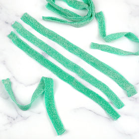 Hampton Green Apple Sour Belts served in a party plate for sharing