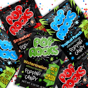 Kids enjoy The Hampton Candy Company Pop Rocks at a party, illustrating shareable snack moments.