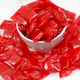 Individual wrappers with The Hampton Popcorn Company Cinnamon Discs emphasize freshness and portability.