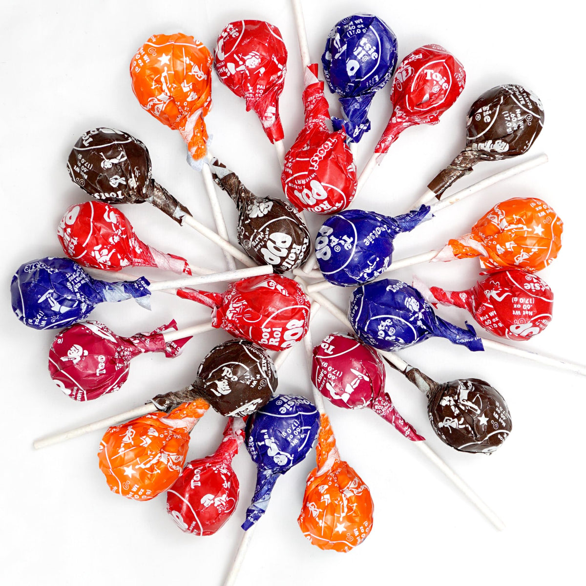 Assorted flavors close-up show cherry, raspberry, grape, orange and chocolate variety.